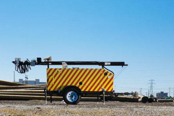 Construction Site Security That Earns Its Stripes - Mobile Pro Systems surveillance trailer at large utility construction site.